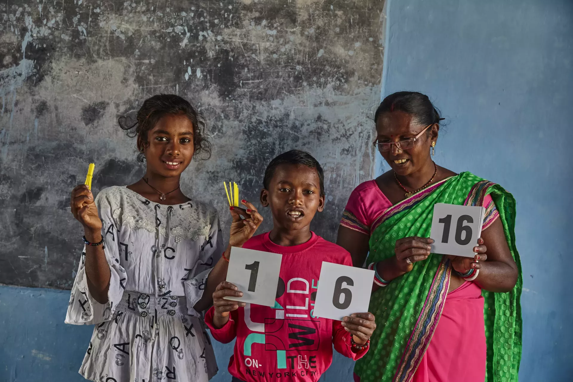 A teacher and her students at a school in India