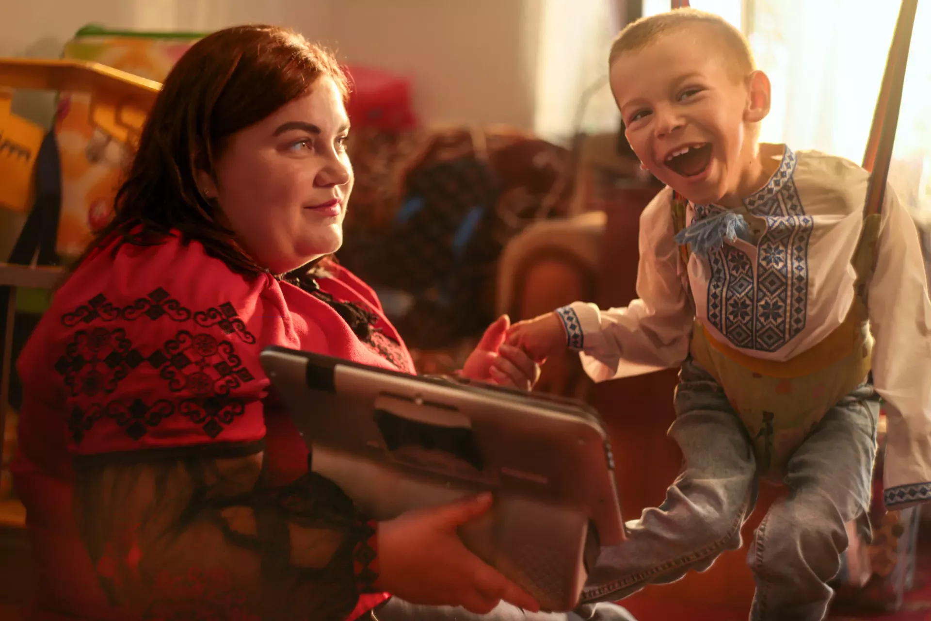 Woman and her child using a tablet