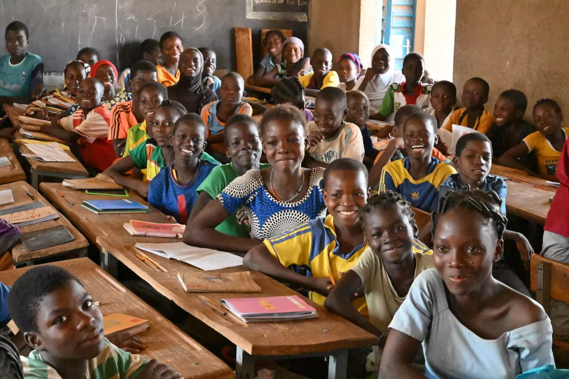 Smiling children in a classroom in Burkina Faso