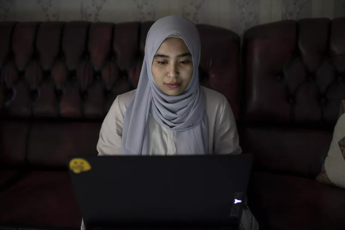 Young woman works as a fact checker