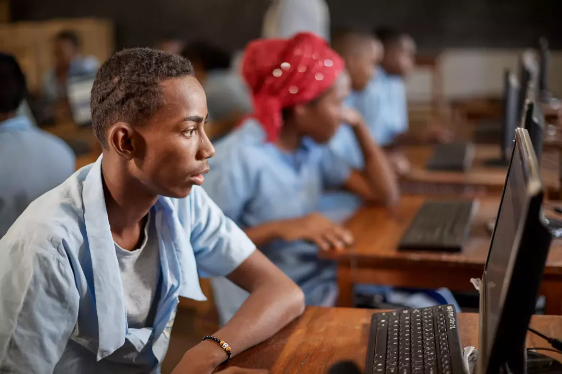 Boy using a computer in Madagascar