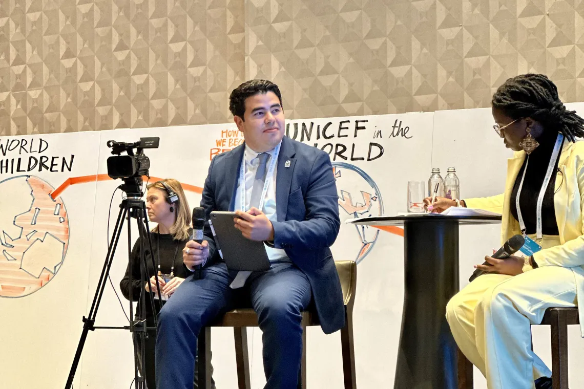 Young adults moderate a panel discussion