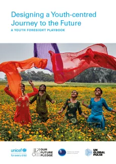 Cover of the Youth Foresight Playbook, featuring a group of girls in India playing in a field of flowers