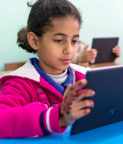 Girl looking at an ipad