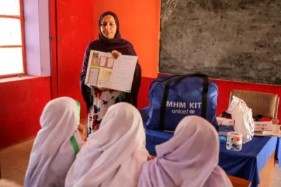 A teacher demonstrating use of Menstrual Hygiene kits consisting of supplies to help girls manage their periods in Balochistan, Pakistan.