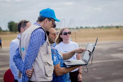 On 28 June 2017, Johannes Wedenig, UNICEF Malawi Representative and the UNICEF Innovation team test an unmanned aerial vehicle (UAVs), also known as a drone carrying a cargo payload box, which can potentially carry humanitarian supplies at the Kasungu Aerodrome in Kasungu in central Malawi. 