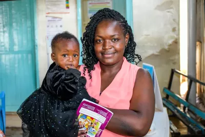 Woman holding child