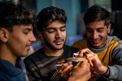 boys using digital device