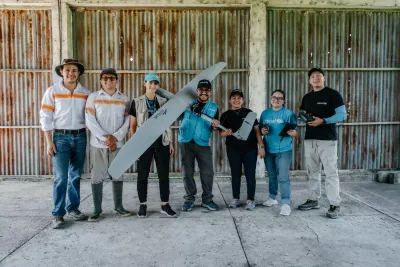 group of people with drone