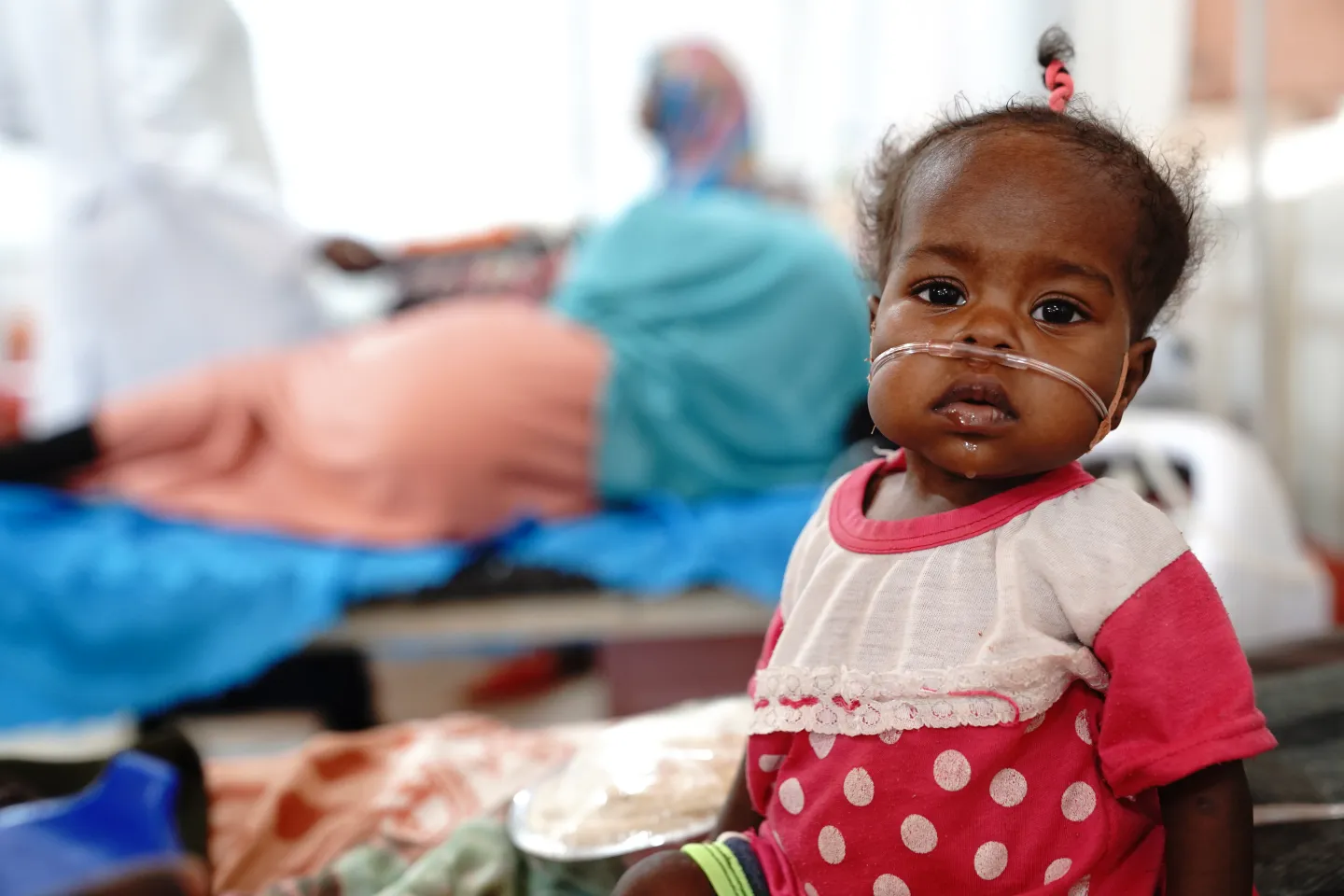 Child in Sudan receiving oxygen therapy