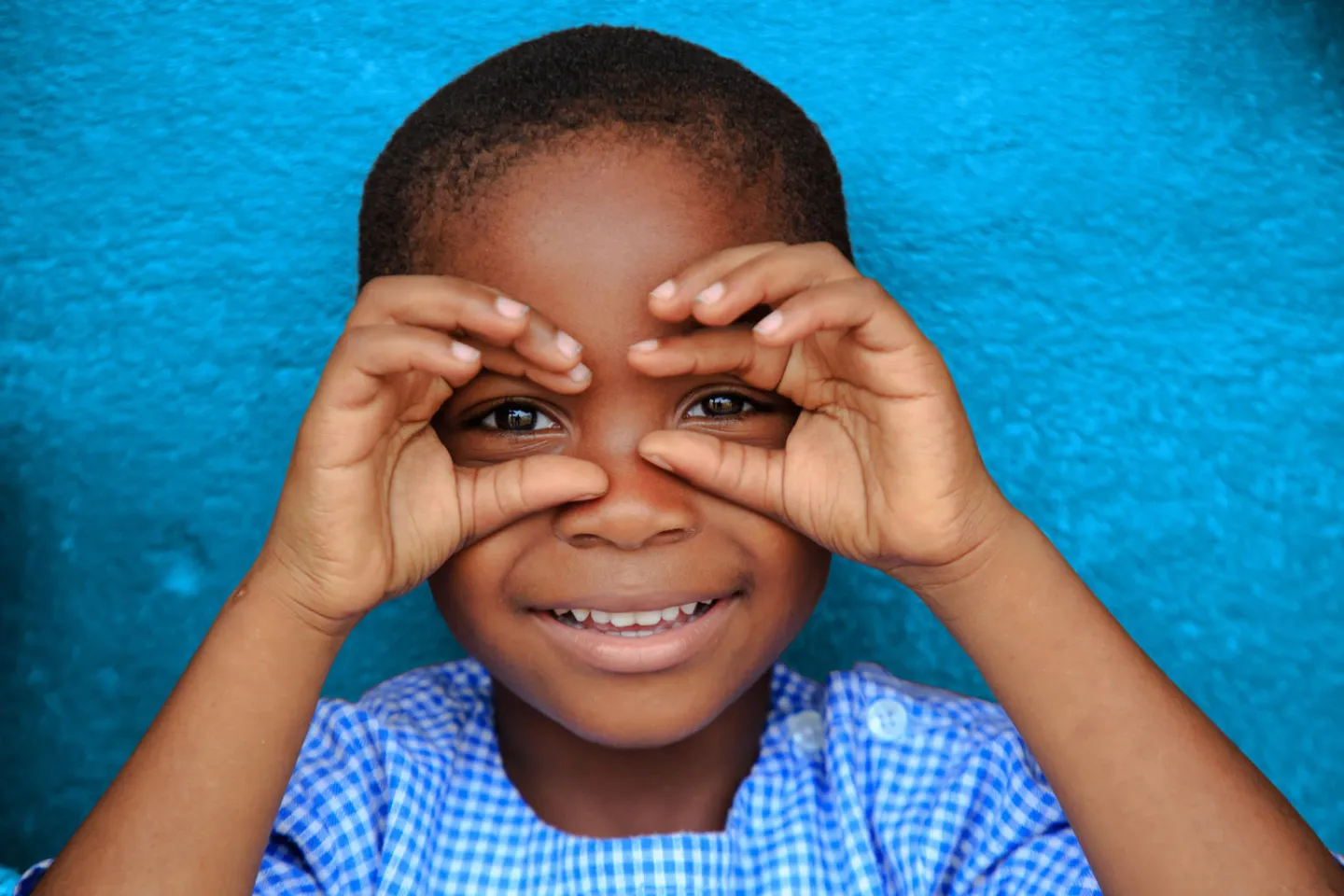 Happy child smiling in Gonzagueville, in Abidjan, C&ocirc;te d'Ivoire.