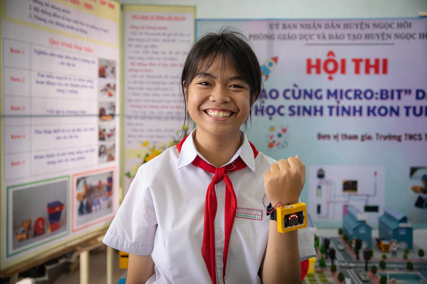 student in Lao with AI powered device