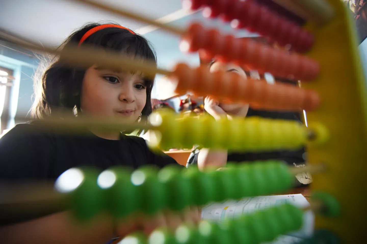 girl playing with toy
