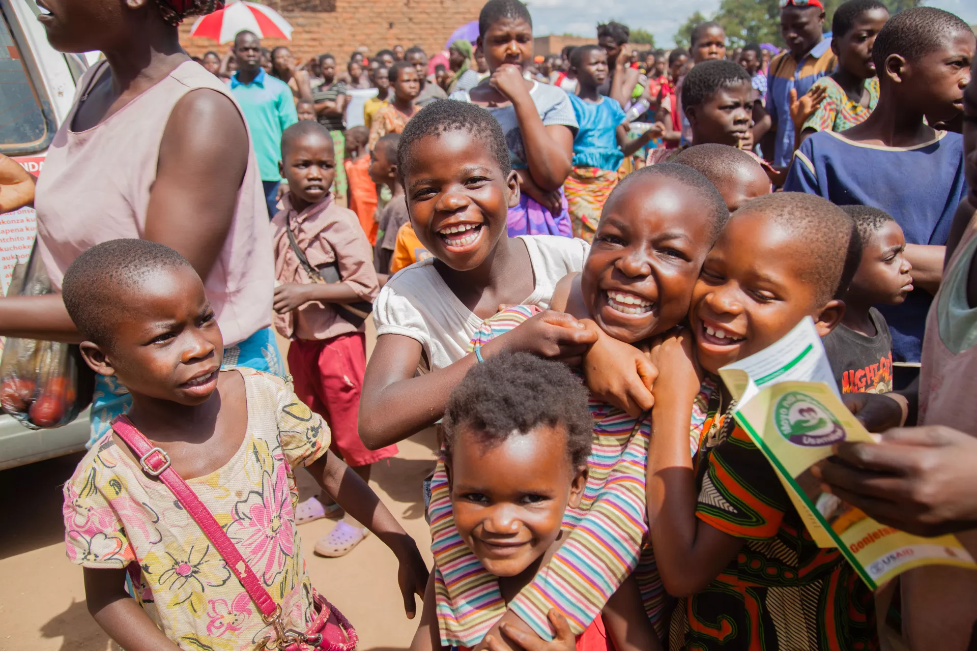 Children in Mitengo, Lilongwe looking onto the drones for cholera activities being undertaken by UNICEF.