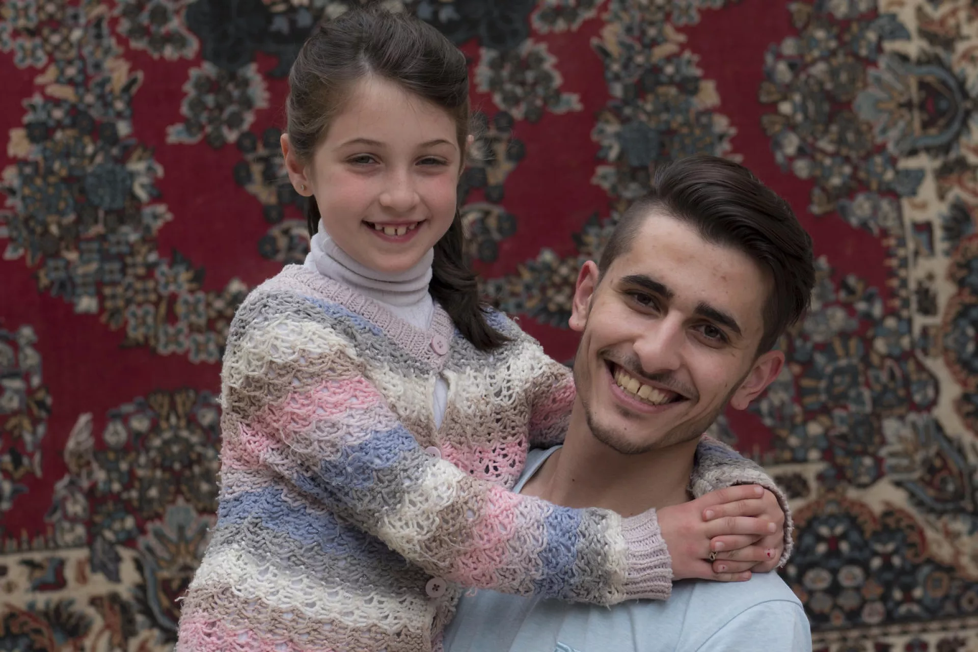 Majd 21 years old from Damascus in Syria with his 8year old cousin Maria aged 8