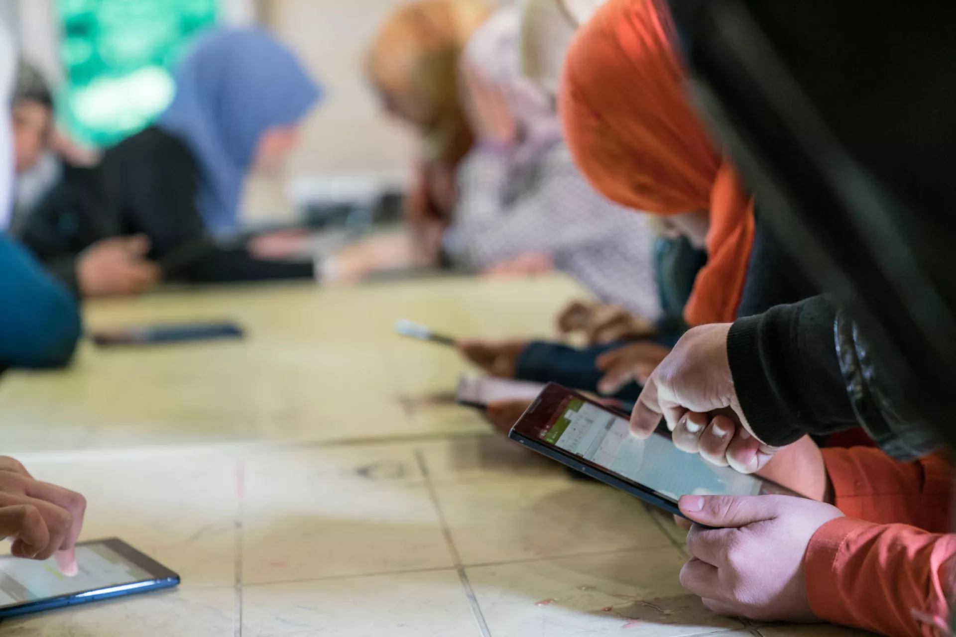  adolescent girls use cellphones and tablets 