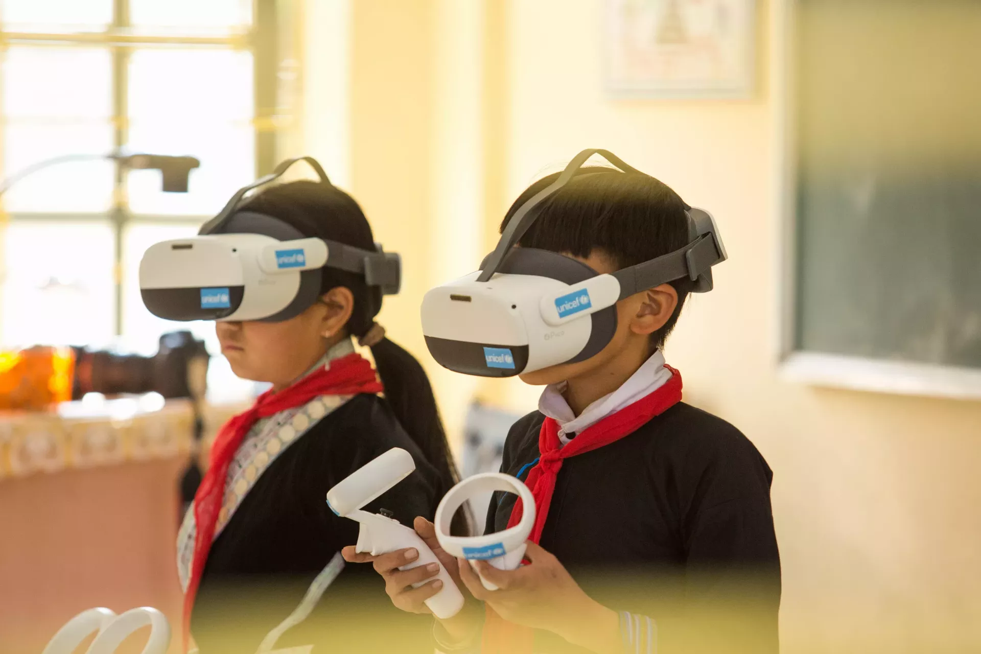 Children using VR headsets