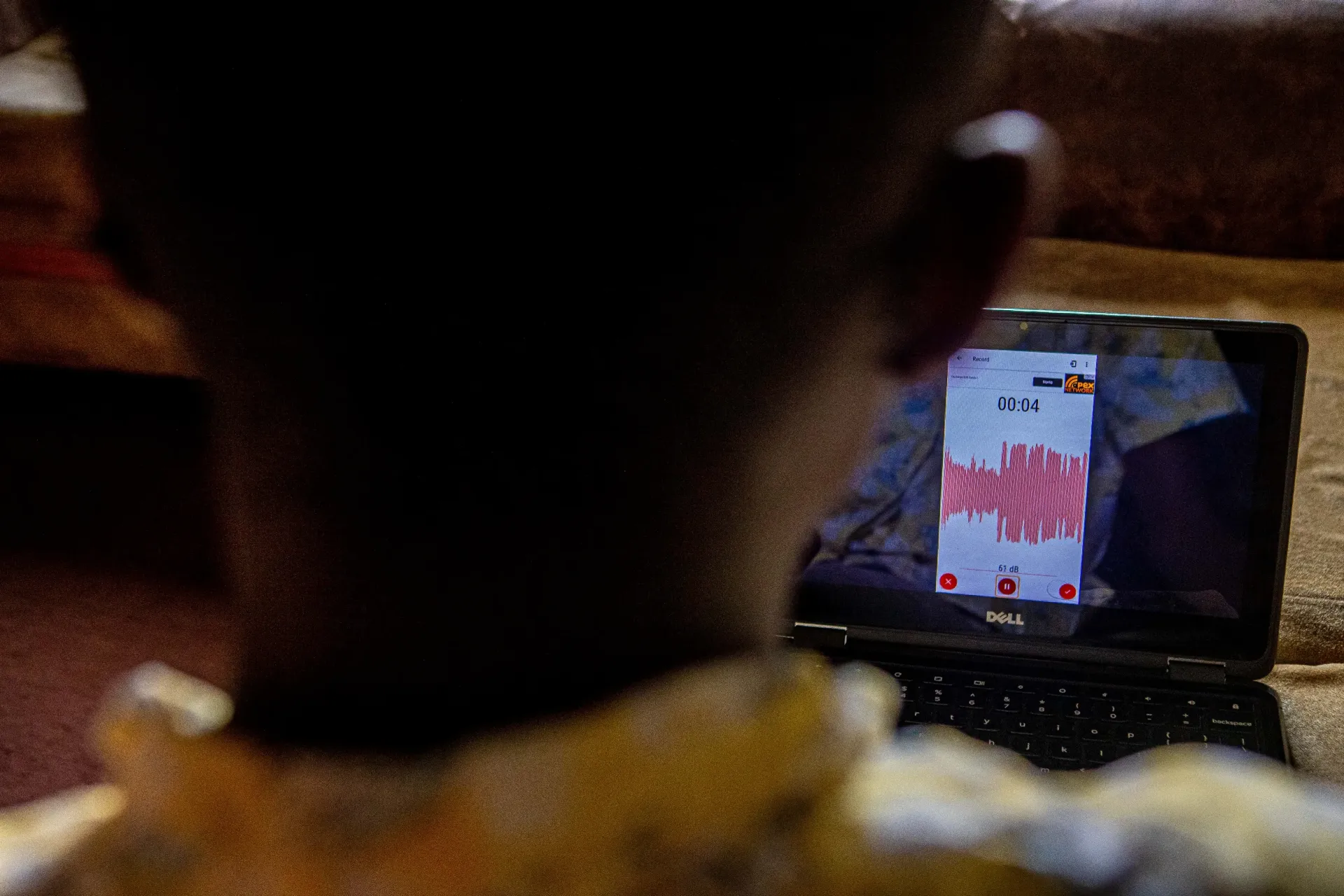 Tinafi Akawu, 15, blind; during one of his song-writing sessions in in his home Jos, Plateau State, Nigeria, on August 23, 2025.