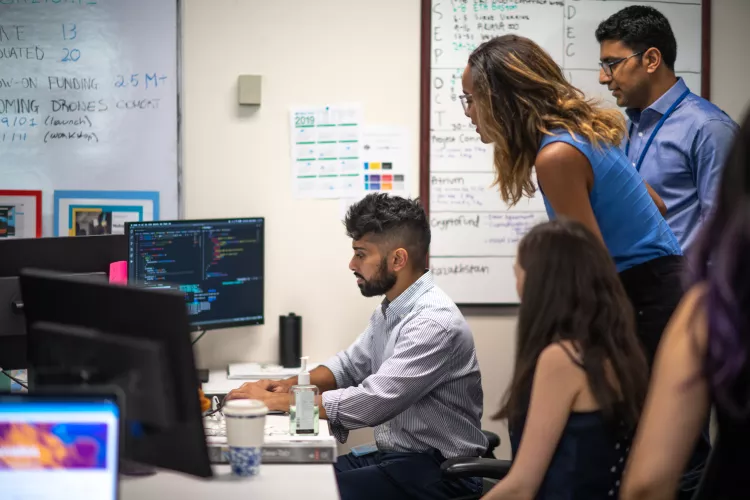 People working and looking at computer