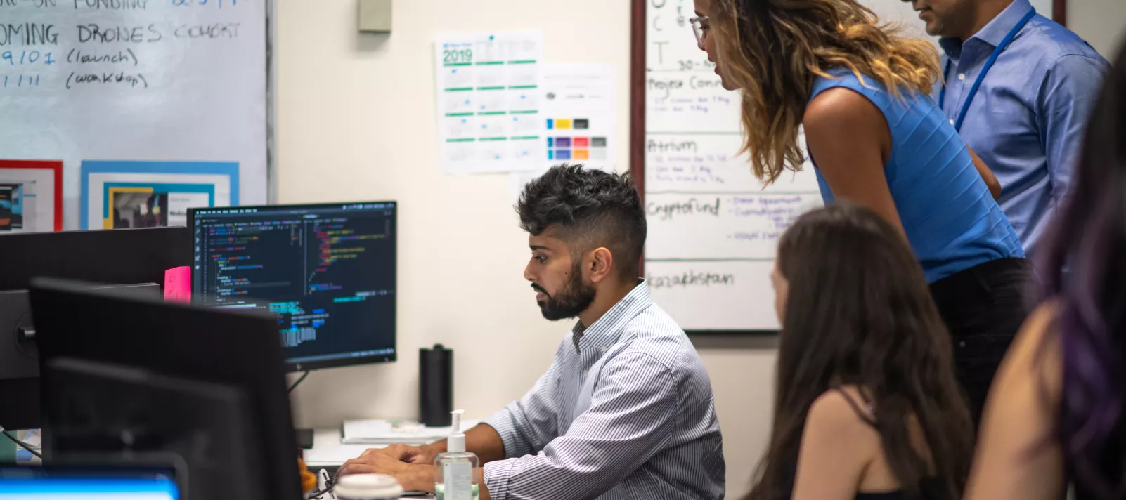 People working and looking at computer