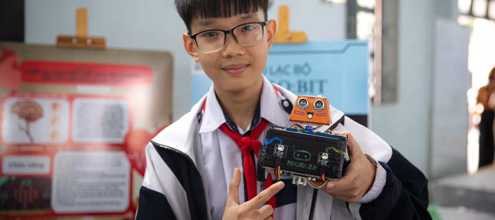 boy holding electronic device 