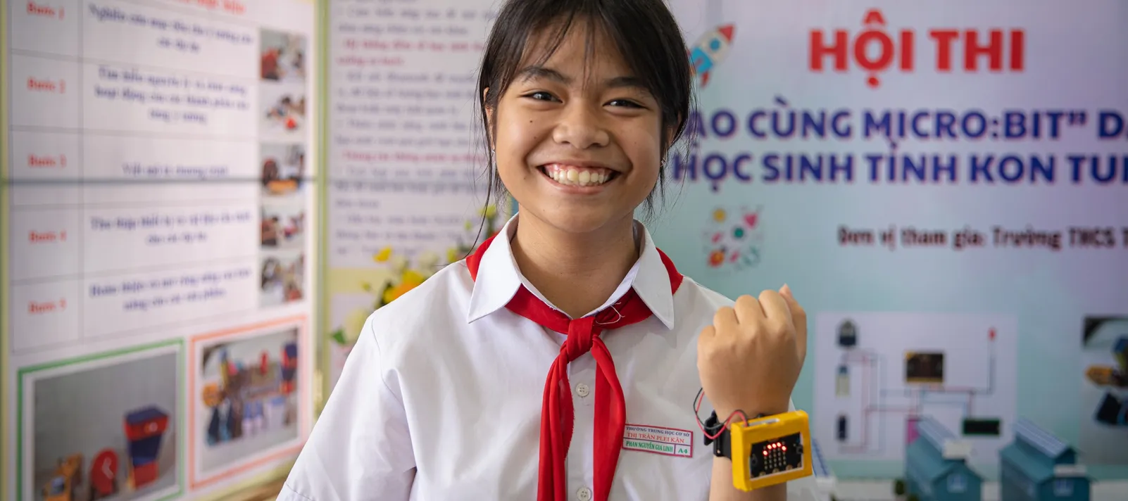student in Lao with AI powered device