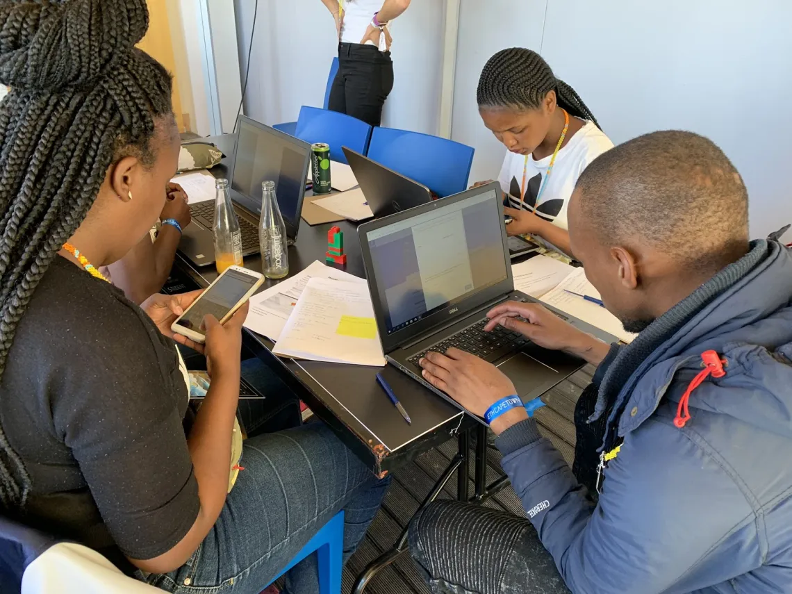 Students at a SURGE event fulfilling bounties to earn Boost tokens in Cape Town. ℅ UNICEF Innovation.