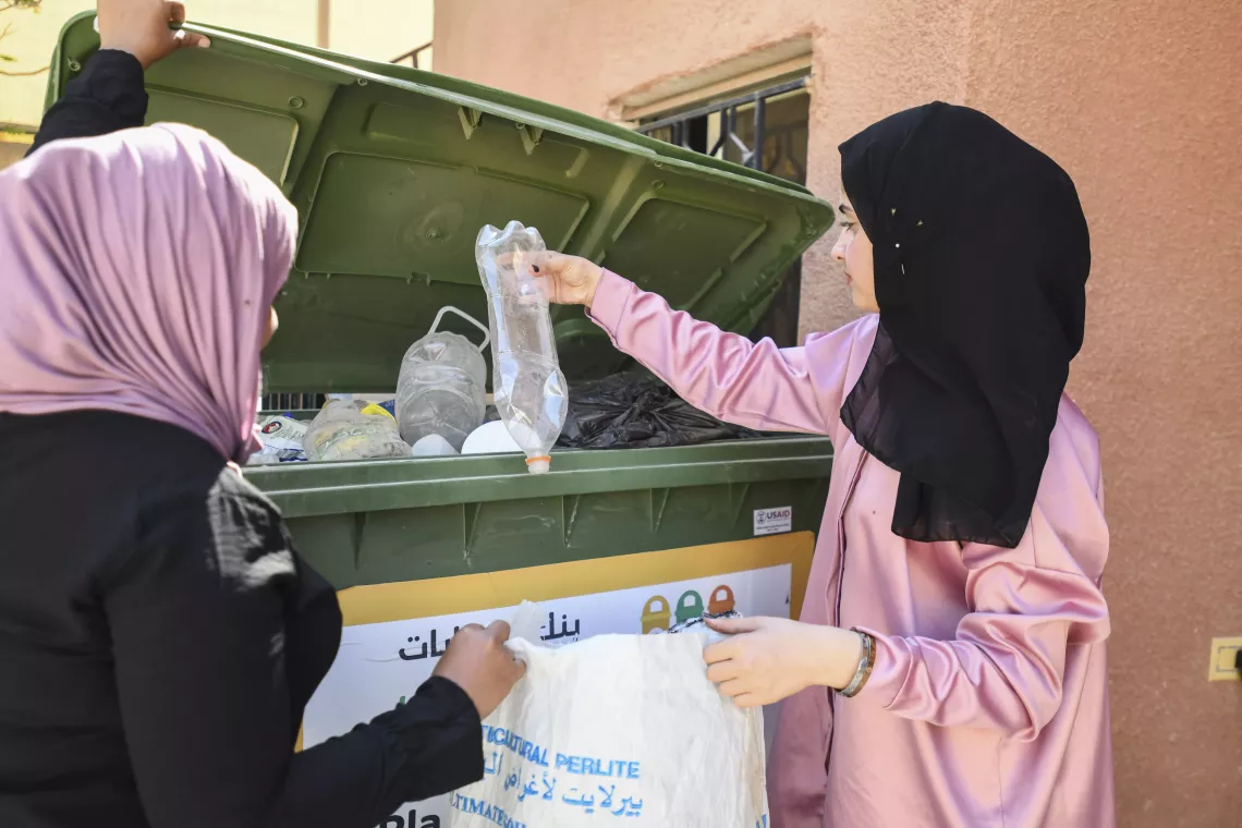 A youth climate leader in Jordan recycles. 