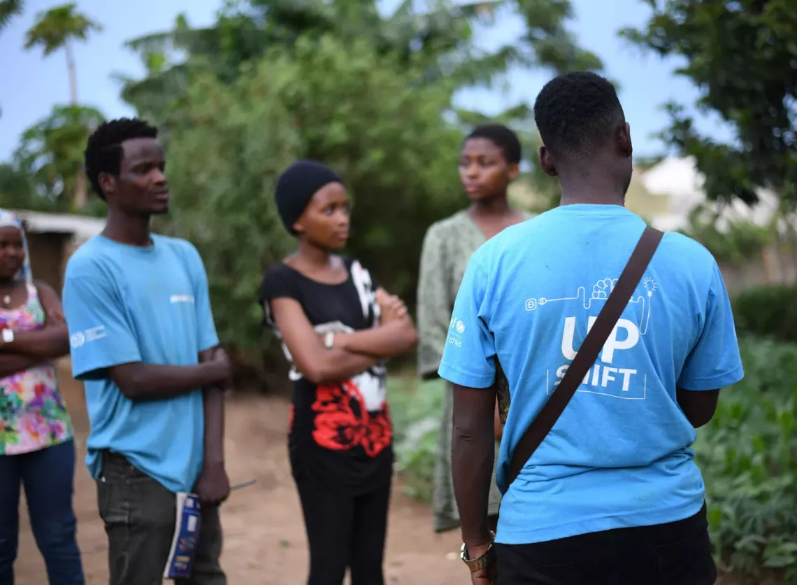 young people talking outside