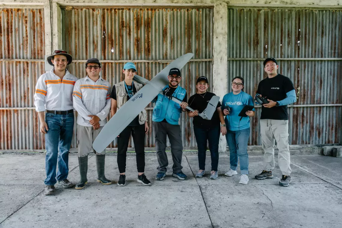 group of people with drone