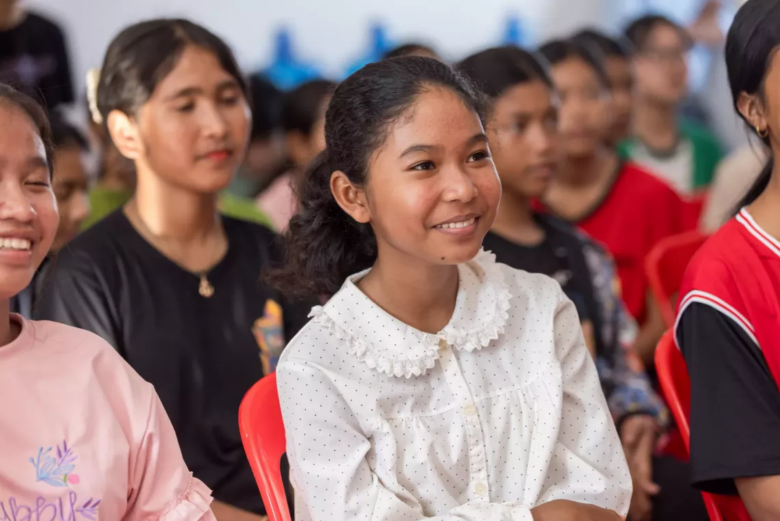 girl smiling with others