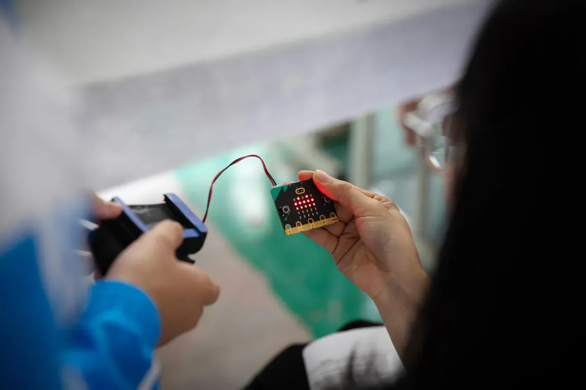 Student using a computer chip