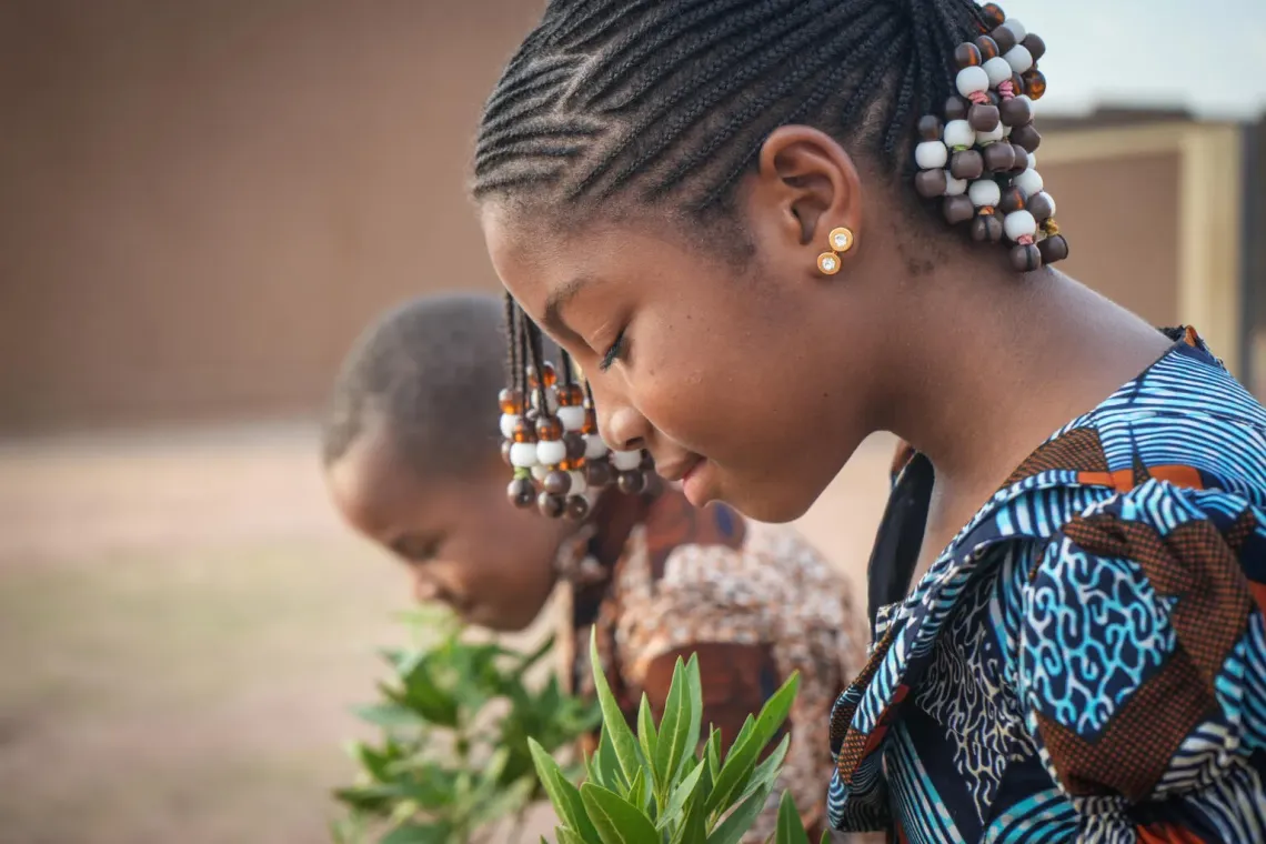 Children planting flowers