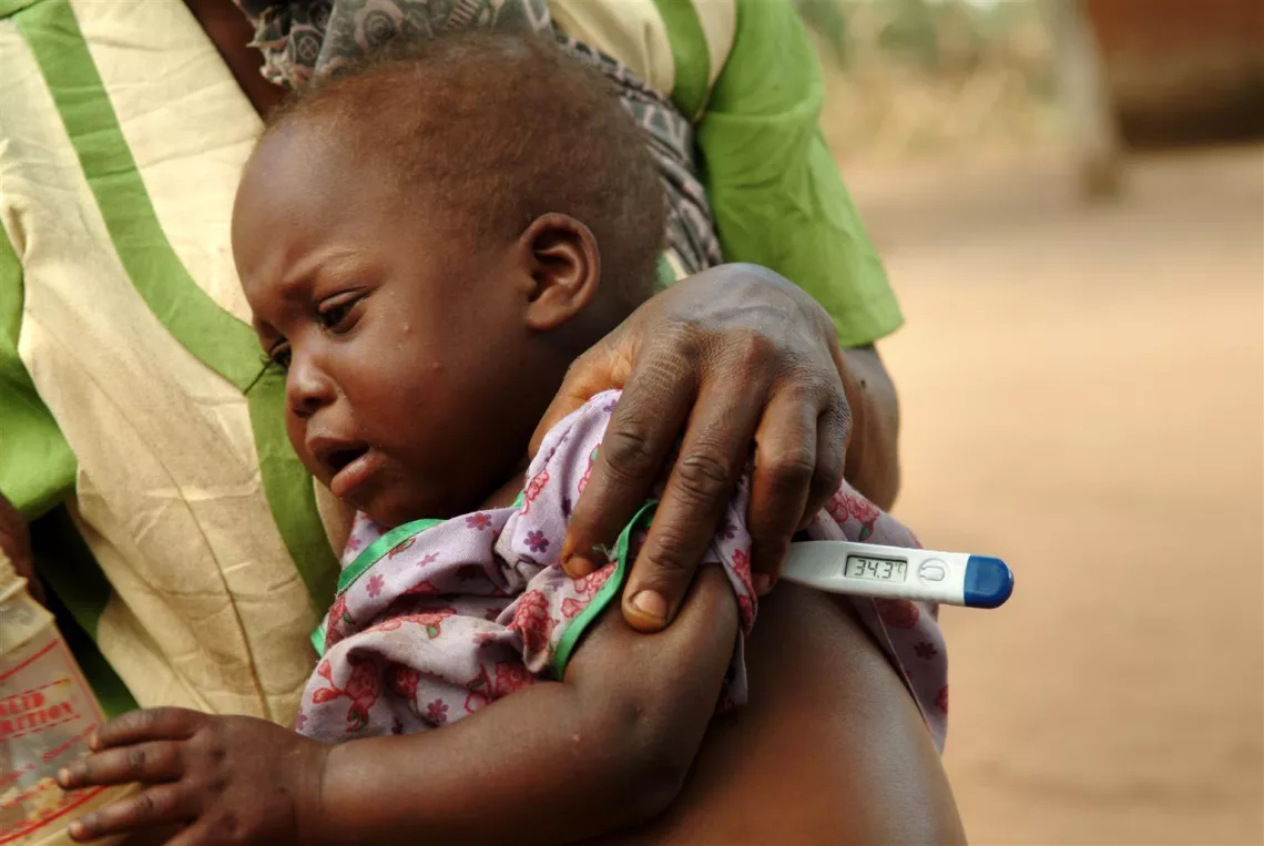 A baby's temperature is measured at Chiwamba Health Centre in Lilongwe, Malawi 