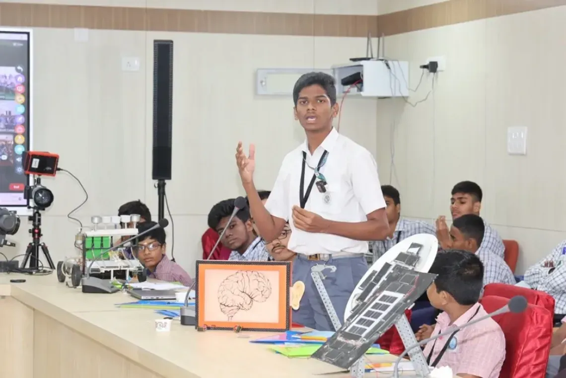 young man speaking during an event