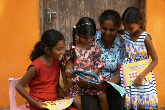 Children and adult using Tilli's solution
