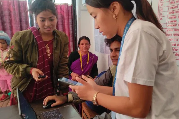 team member interacting with the beneficaries