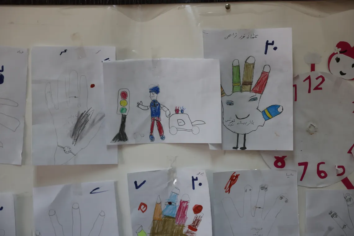 During the sessions, children learn, create, and express themselves through these vibrant paintings guided by the counselor.