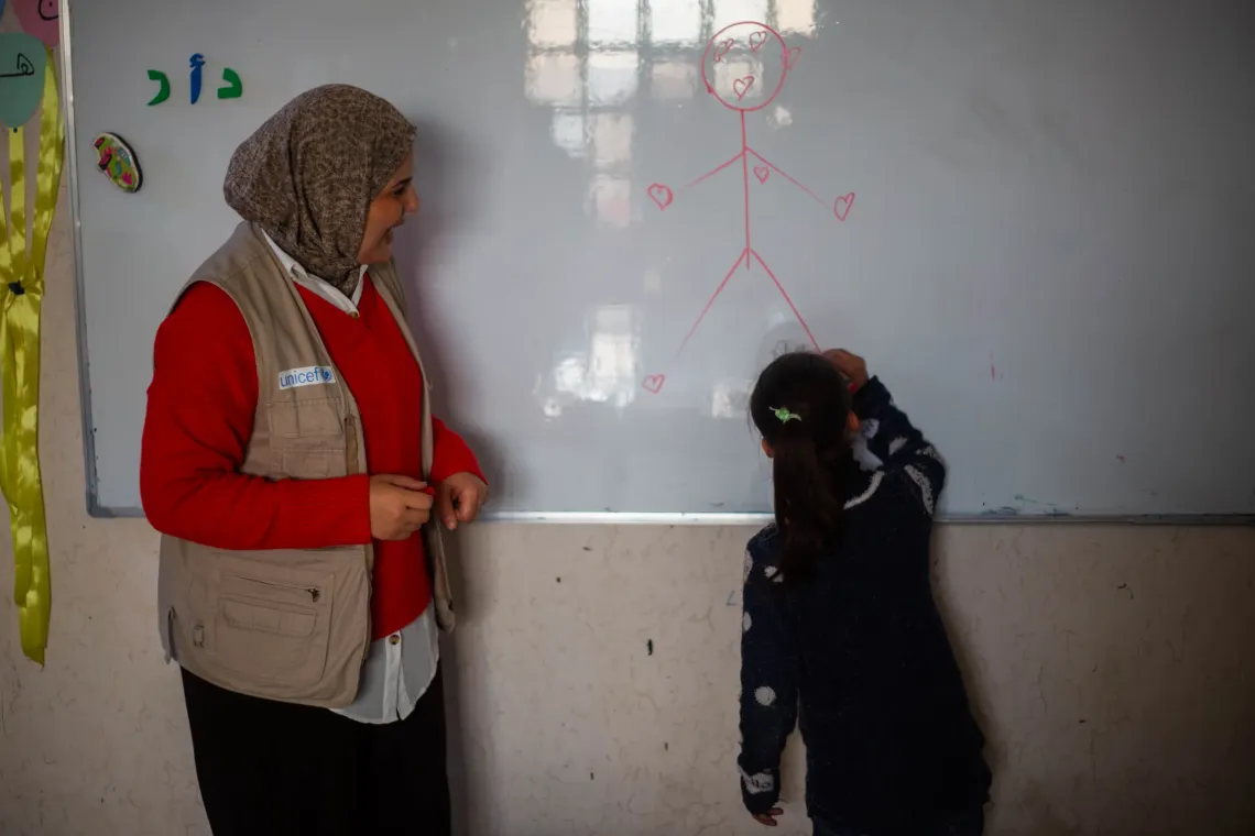 Rana attends accelerated learning classes supported by UNICEF, helping her return to school after years of interruption.