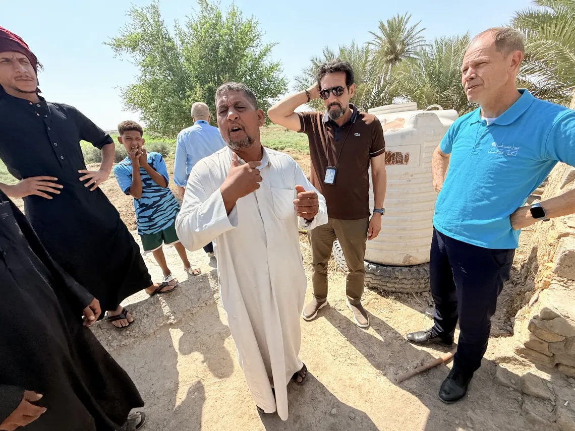 Local community members and UNICEF representatives discuss practical steps to improve water services and expand opportunities for children and young people in Al-Diwaniyah. 