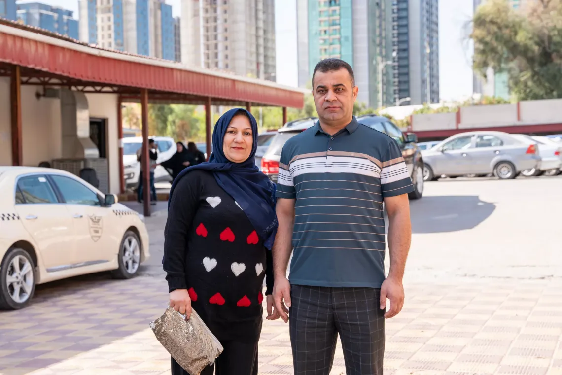  Jehad Fathel and Harewan Ismail receiving cash support in Duhok Governorate, Iraq.