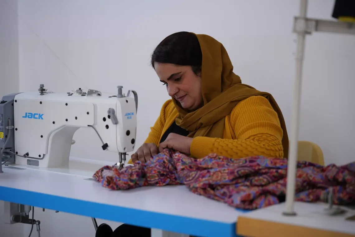 Begard sewing at the Child Protection Center in Chamchamal District, Sulaymaniyah Governorate, Iraq. 