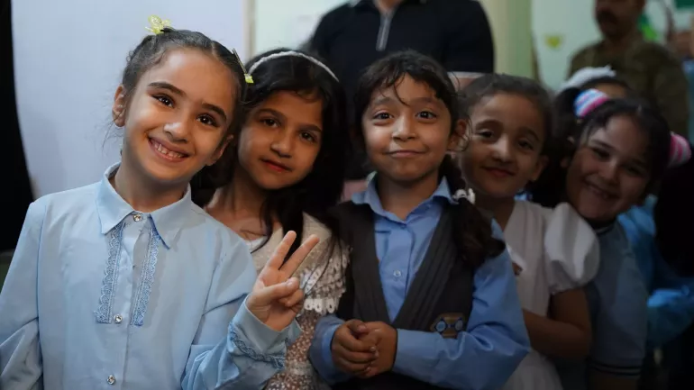 A group of 8 years old girls, Zainab Imad, Jana Majid, Mayar Nadhim, Jood Wissam are waiting for their turn to take the shot in Duhok International Primary School.