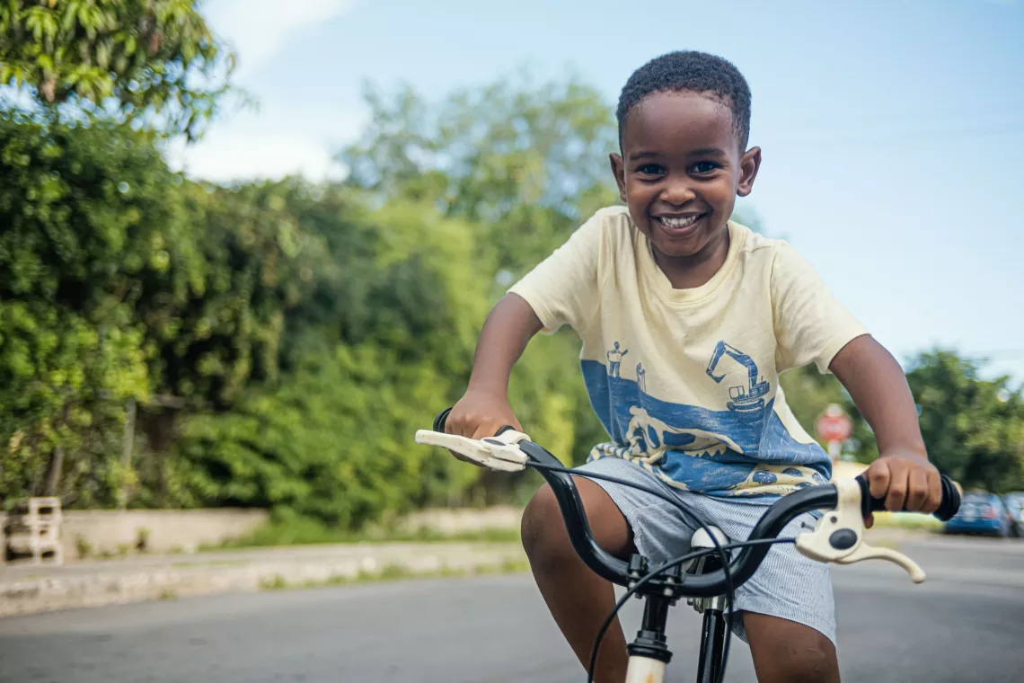 Ari riding his bicycle.