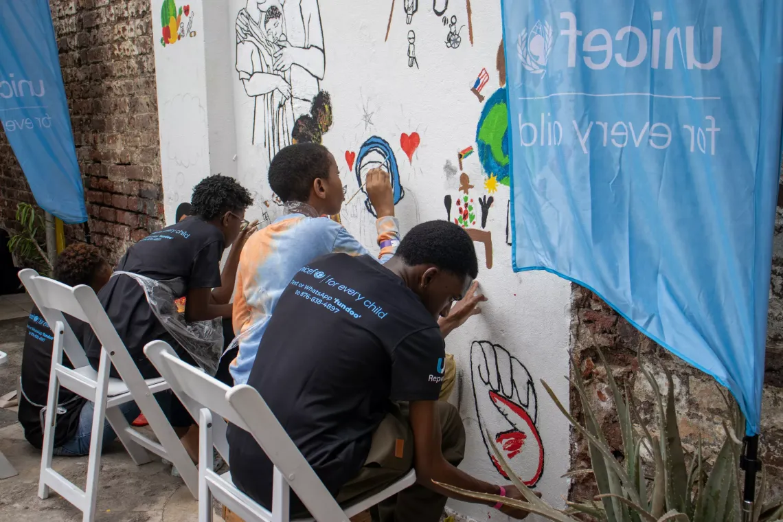 Young artists selected by the Jamaica Cultural Development Commission (JCDC) bring to life the rights of the child through inspiring artwork on a mural on Water Lane in downtown Kingston. The mural was completed during the Kingston Creative Artwalk Festival, in recognition of World Children's Day and the 35th Anniversary of the Convention on the Rights of the Child. 