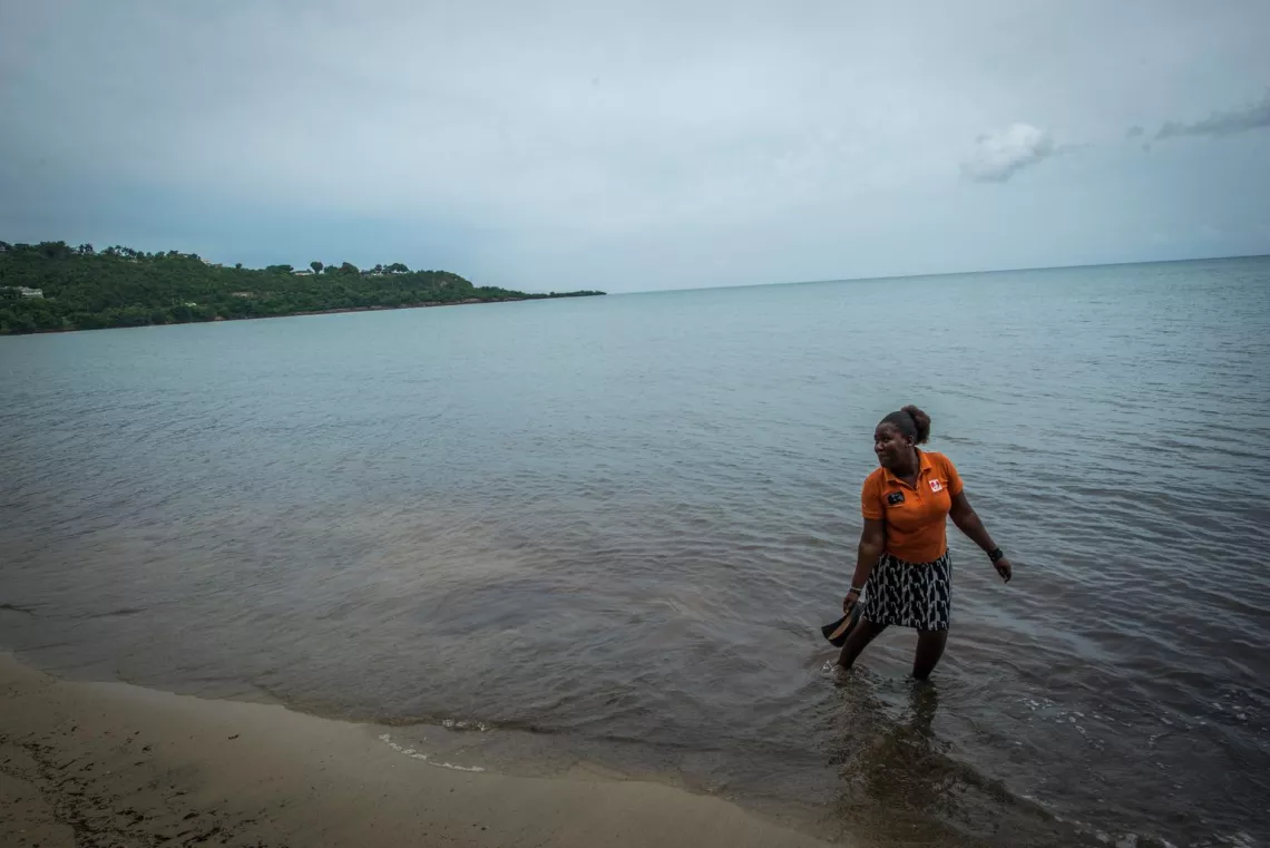 Eve for Life Mentor Mom Monique McDonald, 27, walks on the beach behind her home in Kingston. 