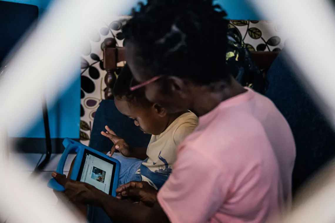 After a full day of school, as soon as six-year-old Ari gets home he wants to share what he has learned with his grandmother.