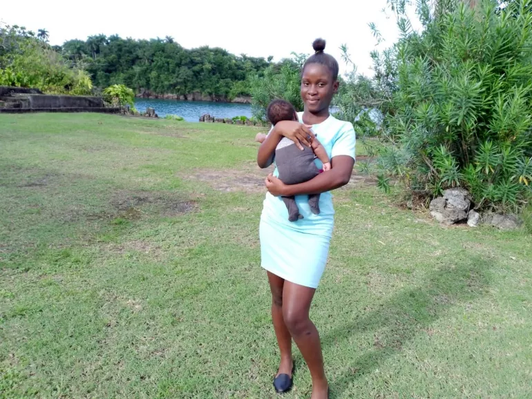 Photograph of Women&rsquo;s Centre of Jamaica Foundation student Lithana Stanly, aged 16, together with her son Tajuan, photographed at the WCJF centre in Port Antonio, Portland. (Photo: Derma Virgo)