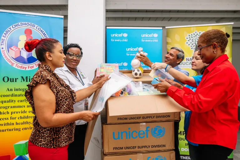 Education stakeholders and UNICEF review educational resources designed to support individualized learning and ensure continuity of education during disruptions. 