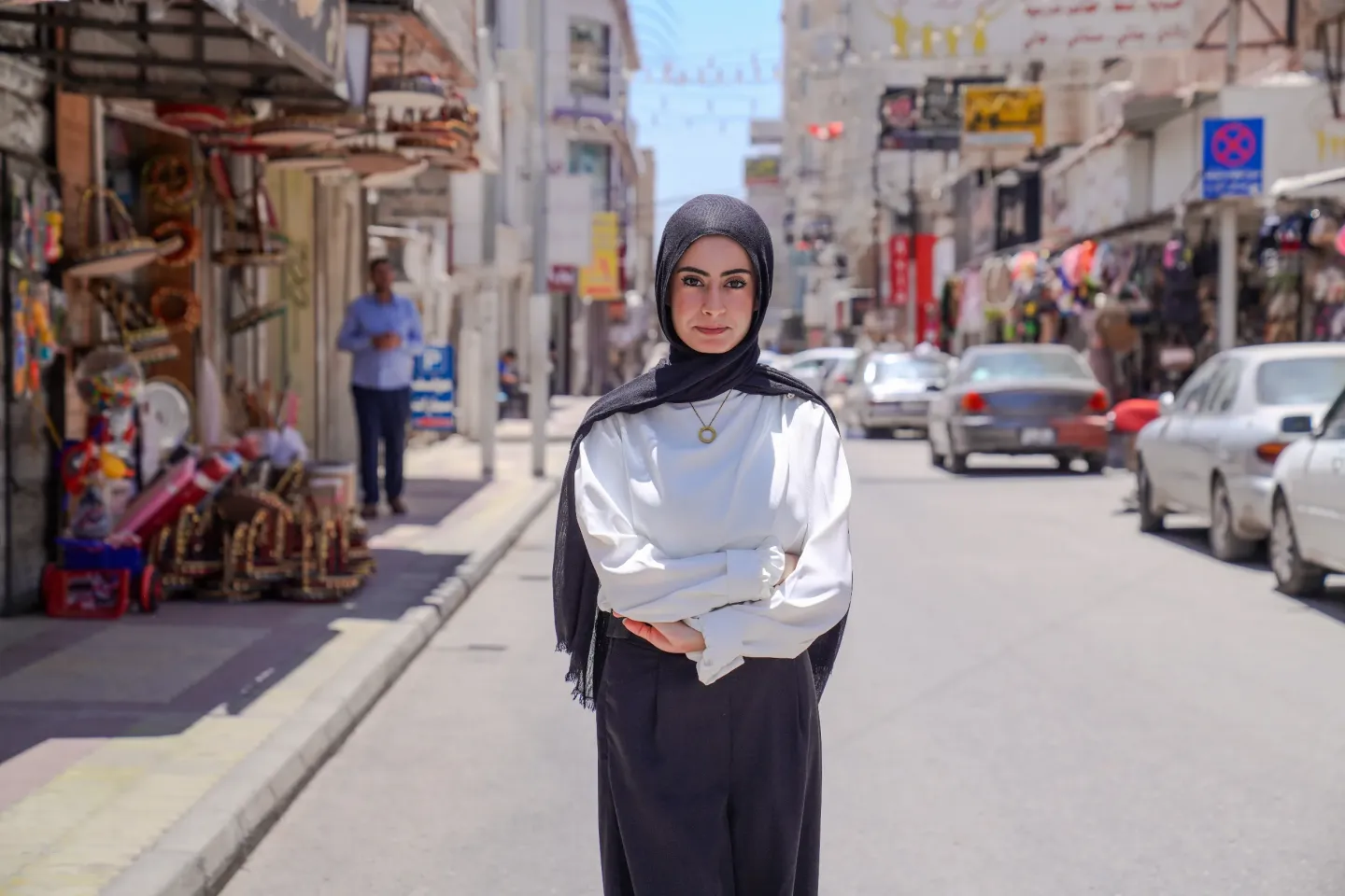 20-year-old Leen pictured just outside her new workplace in Irbid